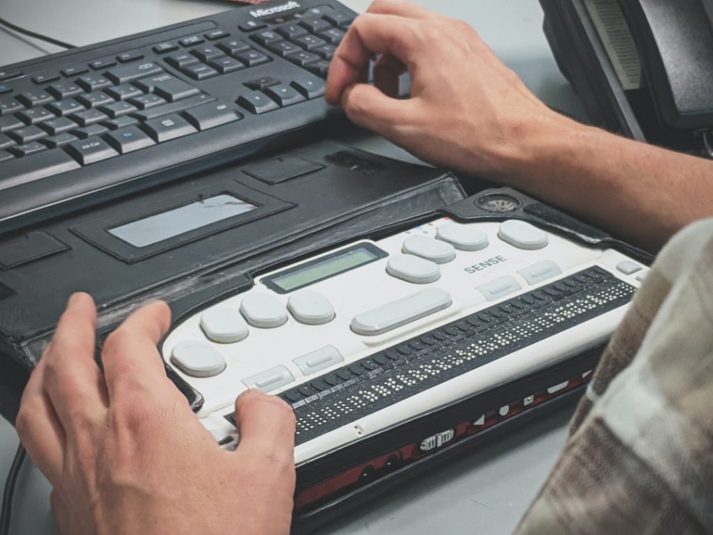 Person using braille display